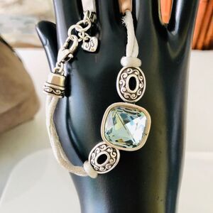 Brighton leather bracelet with light blue crystal.